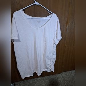 Lane Bryant size 26/28 pale pink shirt with side ruching.